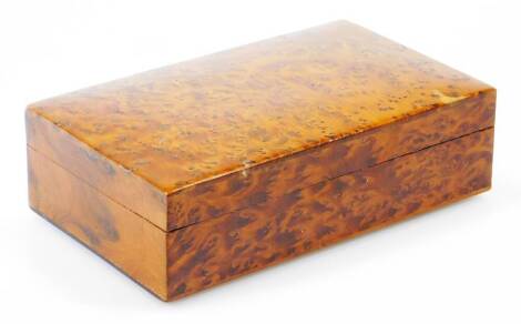 An early 20thC burr wood box, of rectangular form with a cedar style plain interior, 20cm wide.