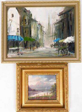 John Gamppeld (20thC). Continental street scene, oil on canvas, signed, 30cm x 40cm, and a further lake scene, oil on board. (2)