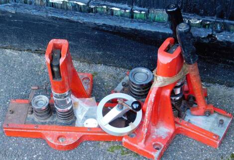 A part metal cased wool worker, in red.