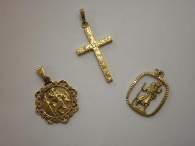 Two St Christopher medallions and a crucifix