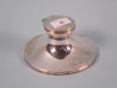 A silver Capstan type inkwell