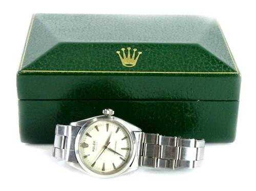 A Rolex Oyster gentleman's wristwatch, with cream coloured dial and silvered hands and points, the dial 3cm wide, with a black seconds bar, on a stainless steel strap numbered 6635 and 57 to lugs, movement numbered 06846, Montres Rolex SA, with box, no p