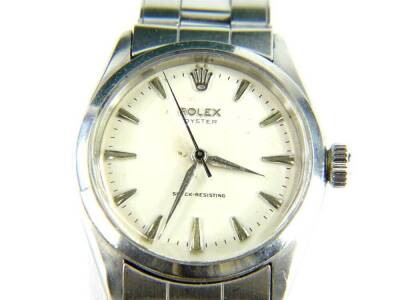 A Rolex Oyster gentleman's wristwatch, with cream coloured dial and silvered hands and points, the dial 3cm wide, with a black seconds bar, on a stainless steel strap numbered 6635 and 57 to lugs, movement numbered 06846, Montres Rolex SA, with box, no p - 2