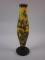 A large coloured and acid etched vase decorated with flowers