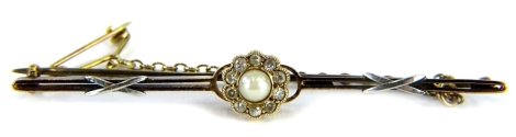 A Victorian bar brooch, set with central cultured pearl, surrounded by tiny old cut diamonds, forming a daisy cluster, on a two row bar with X platinum ends, with safety chain, marked 15ct, 6cm long overall, 4.2g all in, boxed.