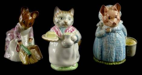 Three Beswick Beatrix Potter figures, Aunt Pettitoes, Ribby and Hunca Munca Sweeping, all brown backstamp.