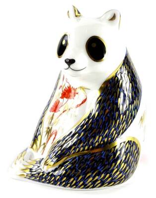 A Royal Crown Derby panda paperweight ornament, gilt stopper, printed marks beneath, 12cm high.