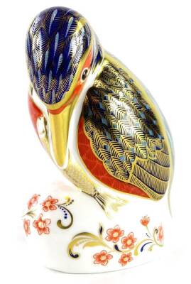 A Royal Crown Derby kingfisher with fish paperweight ornament, gilt stopper, printed marks beneath, 12cm high.