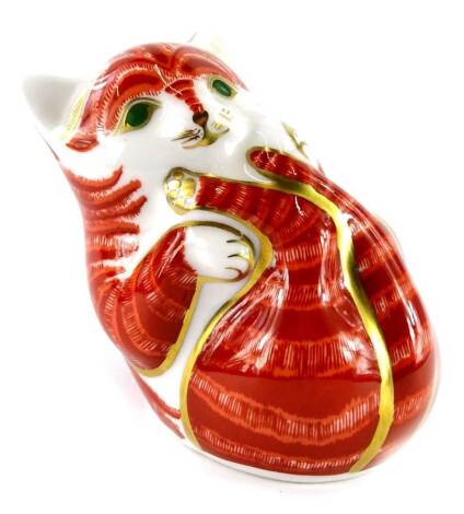 A Royal Crown Derby kitten paperweight ornament, gilt stopper, printed marks beneath, 7cm high.