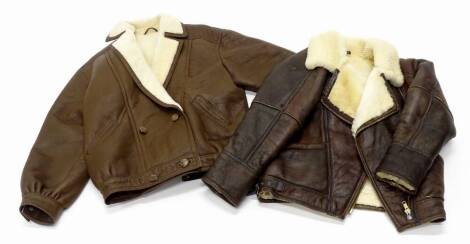 A leather flying type jacket, with wool inlay and a further reproduction flying jacket (2).