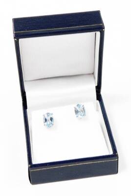 A pair of blue topaz silver earrings, each with oval cut topaz in four claw setting, on single pin back and butterfly back, 1.8g all in, boxed.