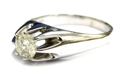 A diamond solitaire ring, the round brilliant cut diamond totalling approximately 0.87ct, in eight claw white gold setting, band marked 18ct, ring size T, 7.8g all in.