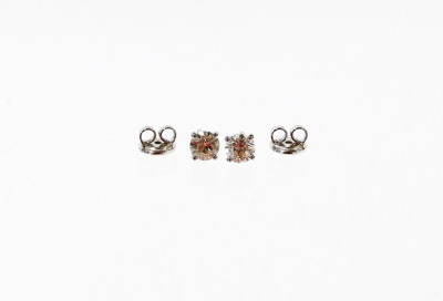 A pair of 18ct white gold diamond stud earrings, the round brilliant cut diamonds, set in four claw setting, each stone approx 4.8mm x 4.8mm x 4.2mm, totalling 1.09cts overall, on single pin back, with butterfly backs, 2.2g all in, boxed. - 2