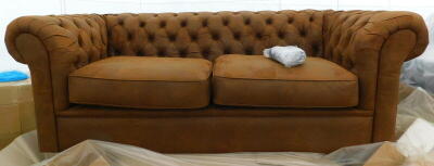 A Fairmont Park Littlehampton brown three seater Chesterfield sofa, RRP £609.99.