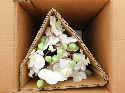 The Seasonal Isle white orchid artificial plant, RRP £32.74.