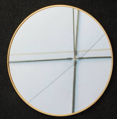 A Hykkon gold finish metal accent mirror, RRP £53.99.