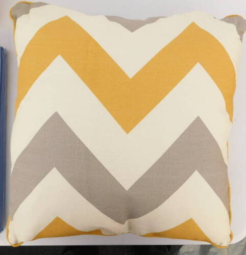 A Zipcode Design Adriell cotton scatter cushion, in grey and yellow zig zag pattern RRP £12.99.