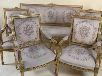 A suite of giltwood furniture in Louis XV style