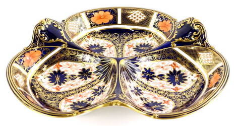 A Royal Crown Derby porcelain trefoil shaped hors d'ouvres dish, decorated with the 1128 Imari pattern, printed marks in red to underside, 27cm wide.