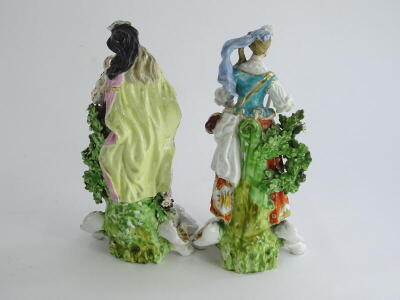 A pair of late 18thC Derby porcelain figures, each modelled in the form of a male and a female musician, on a pierced rococo scroll base, incised number 311 to underside, (AF), 19.5cm high. - 3