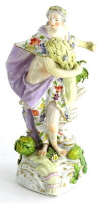 A late 18thC Derby porcelain figure, modelled in the form of a lady holding wheat, on a gilt rococo scroll base, (AF), 22cm high. Auctioneer announce - This lot is 19thC continental and not Derby.