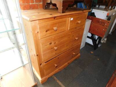 A waxed pine chest of two over two drawers, 92cm high, 91cm wide, 40cm deep.