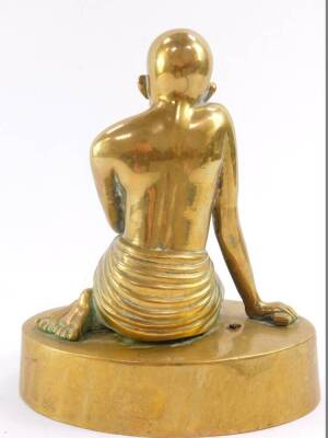 A brass figure of Mahatma Gandhi, modelled kneeling on an oval base, 20cm high. - 3