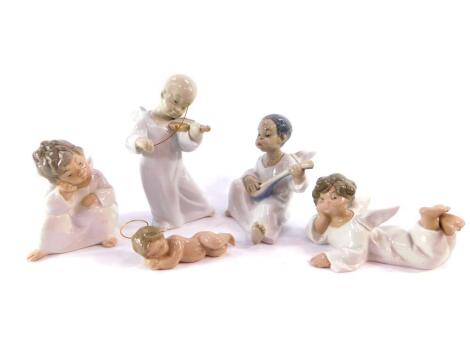 Four Lladro porcelain figures modelled as cherubs, two modelled in contemplation, one playing a lute, the other a violin, together with a Lladro porcelain figure modelled as the baby Jesus. (5)