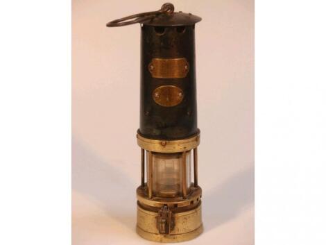 A vintage brass miners lamp by J H Naylor Ltd