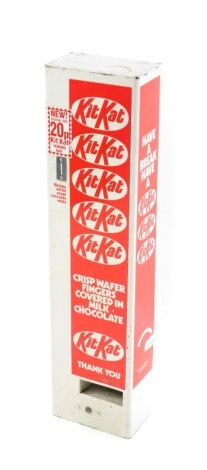 A late 20thC KitKat metal vending machine, in white and red, 90.5cm high.