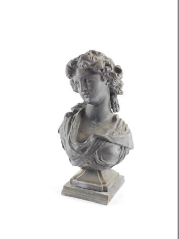 After The Antique. A 19thC lead bust of a lady, raised on a square plinth, 24cm high.