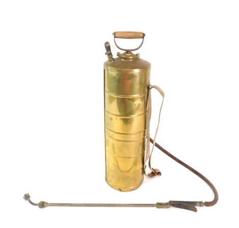 A vintage brass garden sprayer, by The Eclipse Spraying Company of Smethwick, 69cm high.