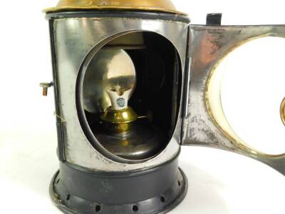 A G Polkey Ltd black painted tin and brass railway lamp, bears plaque, 30cm high. - 3