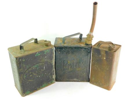 An Esso petrol can., Pratt petrol can with nozzle., and a Shell Mex oil can. (3)