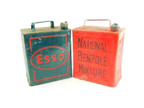 A National Benzole Mixture red petrol can, together with an Esso green petrol can. (2)