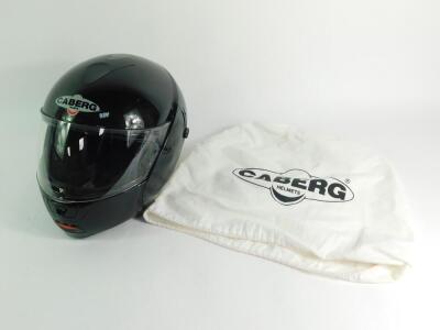 A Caberg Justissimo black motorcycle helmet, with bag, boxed.