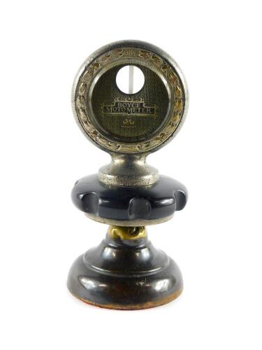 A Boyce Moto Meter Universal Model radiator top temperature indicator, mounted as a desk stand, circa 1920's, 6.5cm wide.