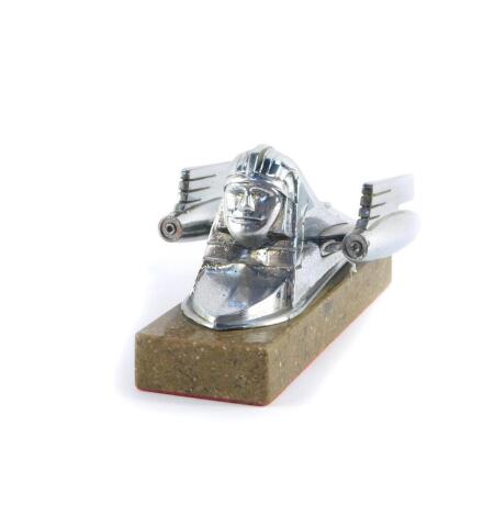 An Armstrong-Siddeley chrome plated sphynx, with jets on wings car mascot, circa 1953-58, mounted on a marble base, 15cm deep.