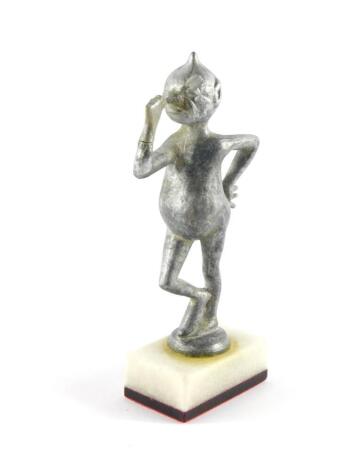 A vintage devil mascot, modelled as Cock-a-Snoot, raised on a marble base, 17cm high. (AF)