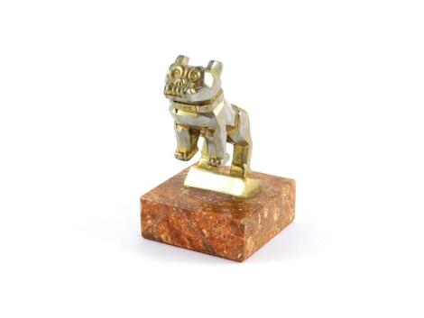 A vintage Mack Bulldog chrome truck mascot, designed by A.F Masury, raised on a marble base, 13cm high.