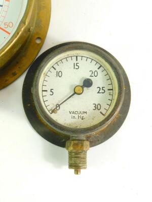 A Tomey brass cased circular altitude gauge, 18cm diameter., a Bar and PSI gauge, and a vacuum in. HG. gauge.(3) - 3