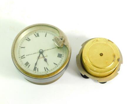 A North and Sons Ltd Watford vintage car clock, no. 2705, 8.5cm diameter, together with a further car dashboard instrument. (2)