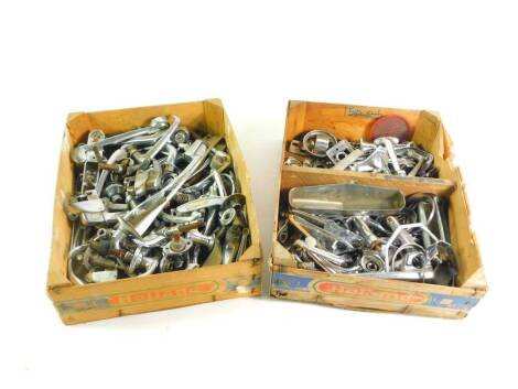 Chrome car door and window handles, together with escutcheons. (a quantity)