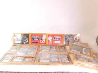 Twenty nine framed prints of Formula One World Champions, (between 1950 to 2004)., to include Graham Hill., Jackie Stewart., Nikki Lauda., Nigel Mansell., Damon Hill and Michael Schumacher.