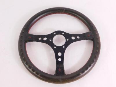 An Irmscher Opal / Vauxhall three spoke steering wheel, leather bound, serial no E1 / 0270503, 35.5cm diameter. - 2