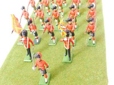 A set of Britains Scots Guards, board mounted. (28) - 2