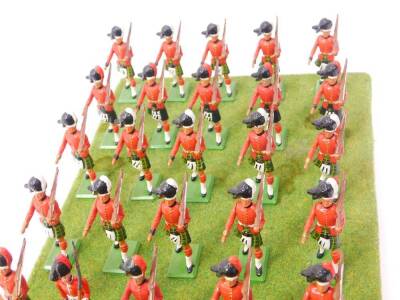 A set of Britains Scots Guards, board mounted. (28) - 3