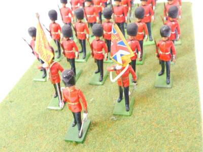 A set of Britains Grenadier Guards, board mounted. (33) - 2