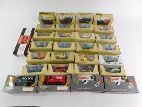 Four Corgi die cast emergency vehicles, together with Models of Yesteryear vintage trucks, cars and buses, all boxed. (2 trays)