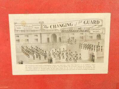 Britains 155 The Changing of the Guard at Buckingham Palace, a collection of painted lead soldiers of the Coldstream guards band and marching guard, Scott's guards, four sentry boxes, in original two tier illustrated labelled display box, one sentry box a - 4